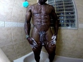 Hot dark-hued man demonstrates off big manstick in bathroom (TheeBlackHammer.com)